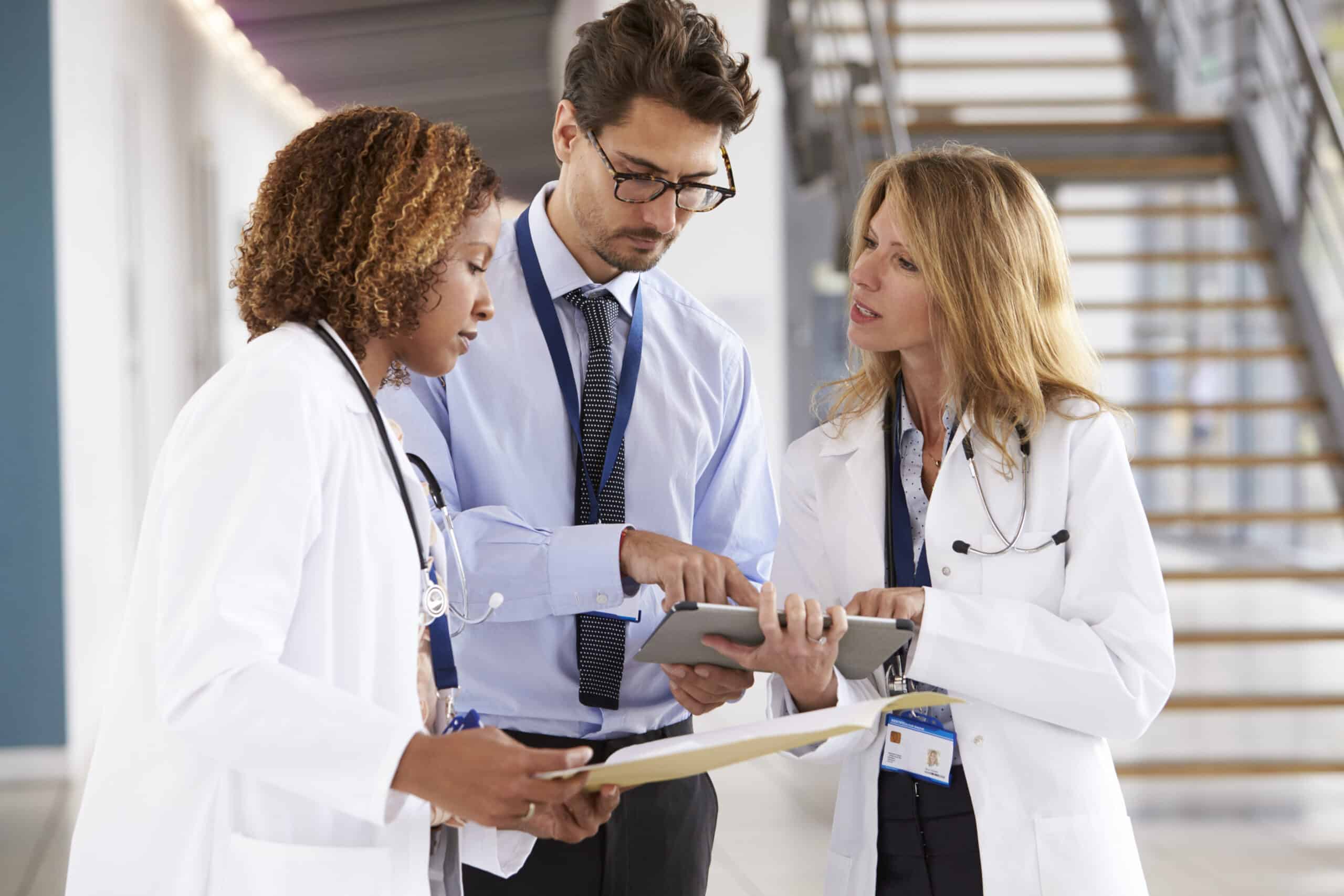 Clinicians collaborating in a modern clinic